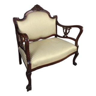 Late 19th Century Victorian Carved Mahogany Settee in Shimmering Cream & Gold Ball and Claw Feet For Sale