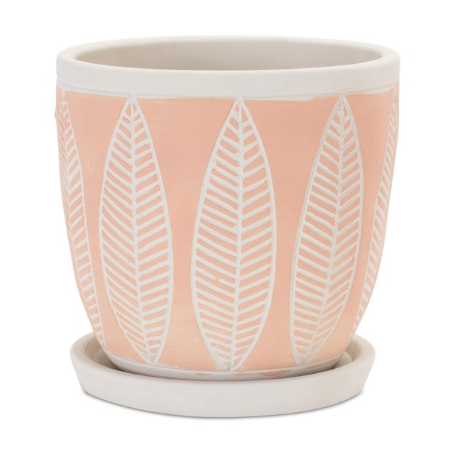 Elevate your indoor plant display with the Stone Planter with Plate Set. This stunning pair features a contemporary leaf...