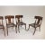 A set of 6 Modern dining chairs. The chairs are in the manner of Robsjohn Gibbings. The Klismos style dining chairs are...