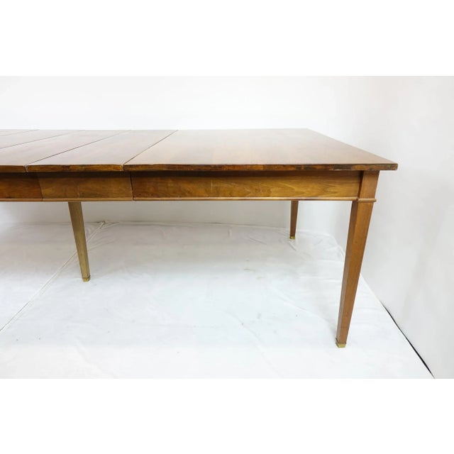 This 1960s vintage all-wood dining table offers both elegance and practicality, featuring a sturdy design and timeless...