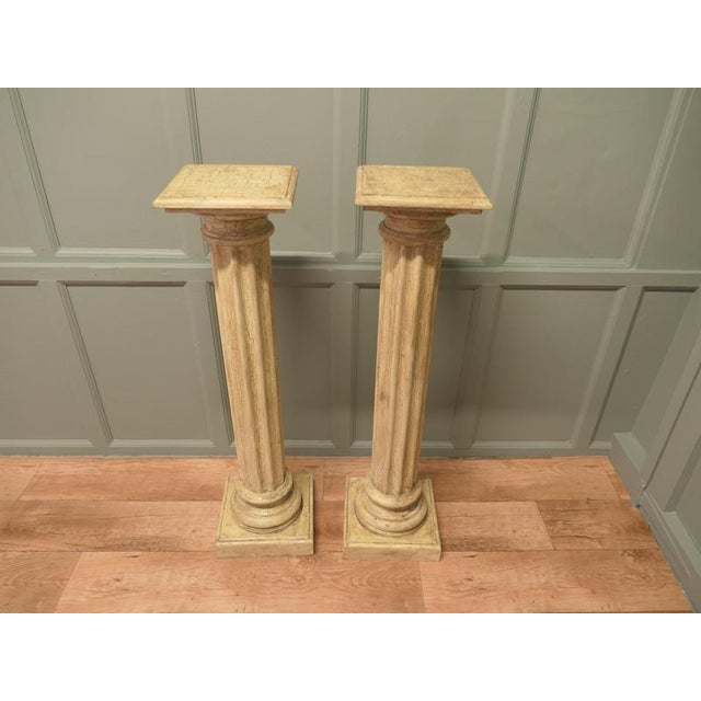 Pair of Shabby Classical Columns in Distressed Crackle Finish A Superb pair of Fluted Classical Column Pedestals, the...