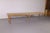 An exceptional oversized antique pine farmhouse table measuring an impressive 12.5 feet long. The long, narrow proportions...