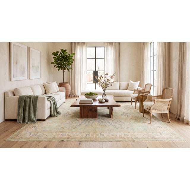 Elevate high-end interiors with this contemporary Oushak-style area rug, hand-knotted from soft, premium hand-spun wool....