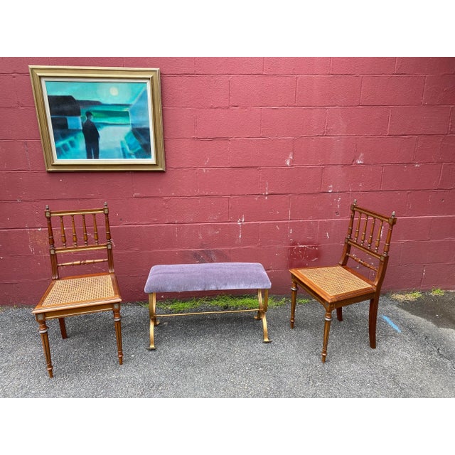 A handsome pair of French Louis XVI style side chairs dating to the early 20th century, distinguished by their elegant...