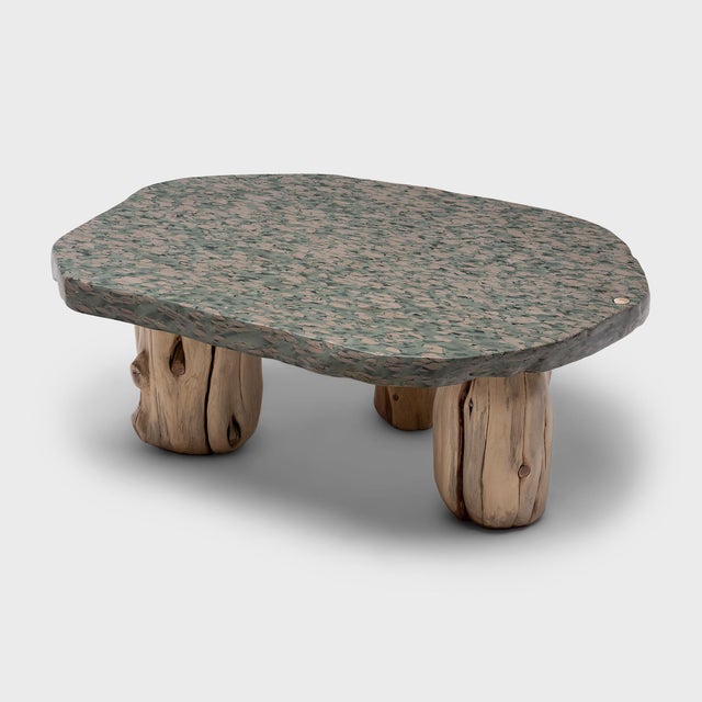 This meditation stone coffee table exemplifies organic modern style with an emphasis on natural materials. The stone slab...