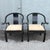 Dramatic pair of vintage James Mont-style horseshoe armchairs inspired by traditional Chinese furniture forms. Each chair...