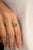 This is part of Chairish’s Fine Jewelry assortment. Art Deco Style Emerald Engagement Ring with Halo Diamonds in 14K Gold...