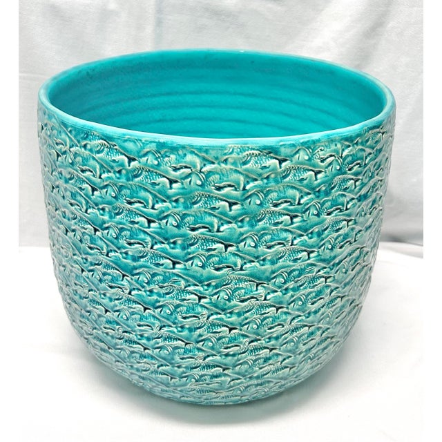 A striking vintage ceramic planter produced by Ceramicosta of Portugal, known for its richly textured pottery. The surface...