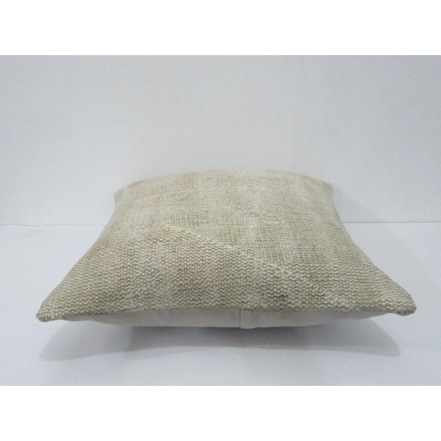 Decorative pillow cover made from a vintage Turkish handknotted rug. Backed with good quality cotton fabric. Pillow...