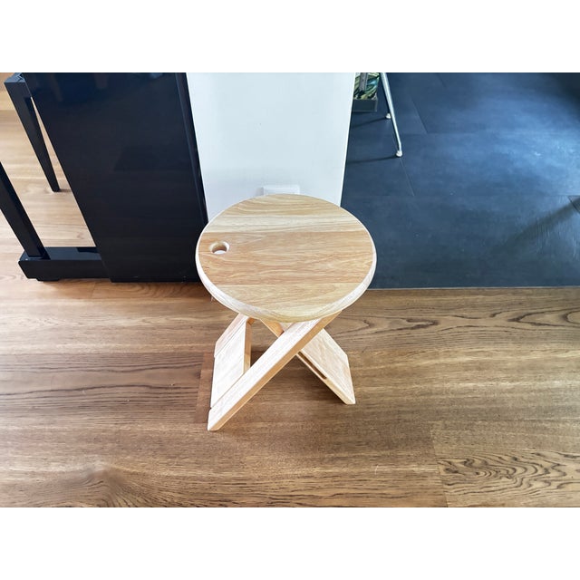 Folding solid wood stool that can be hung on a wall, in near-new condition I have official proof of authenticity such as...