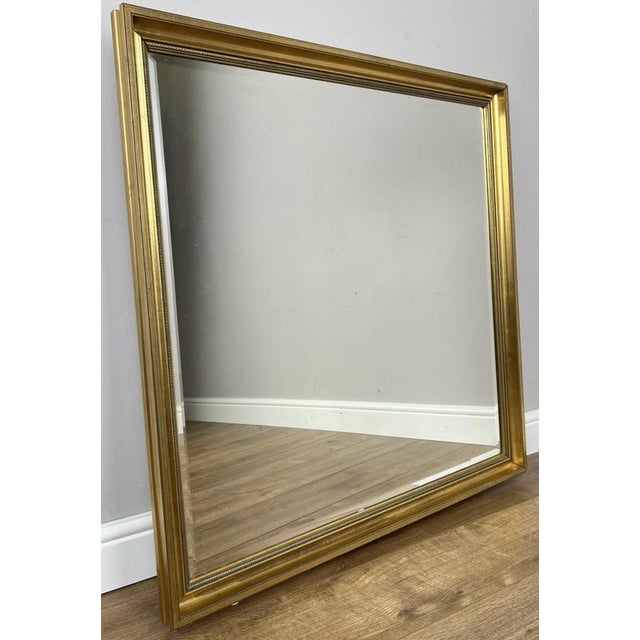 This elegant Vintage French wall mirror features a classic rectangular frame with a refined polished mirror, making it a...