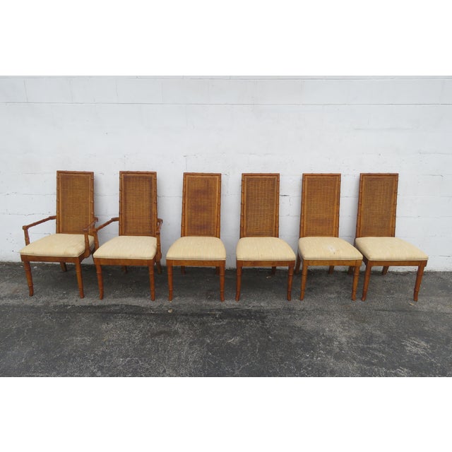This classic Hollywood Regency Set of Dining Table and Six Chairs is made of wood, solid wood, veneer, caning, and...