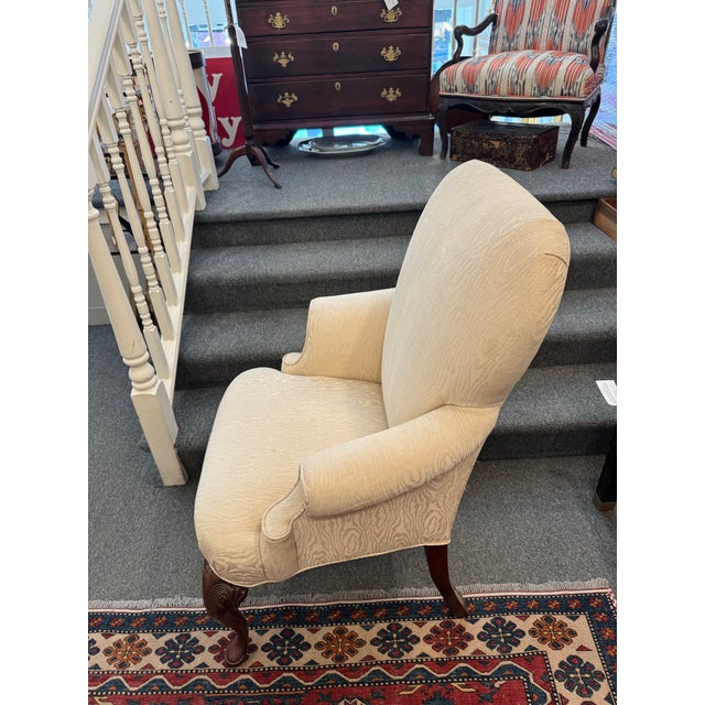 This is a vintage French chair. It has a newly reupholstered zebra fabric. It has queen Anne style carved legs. The wood...