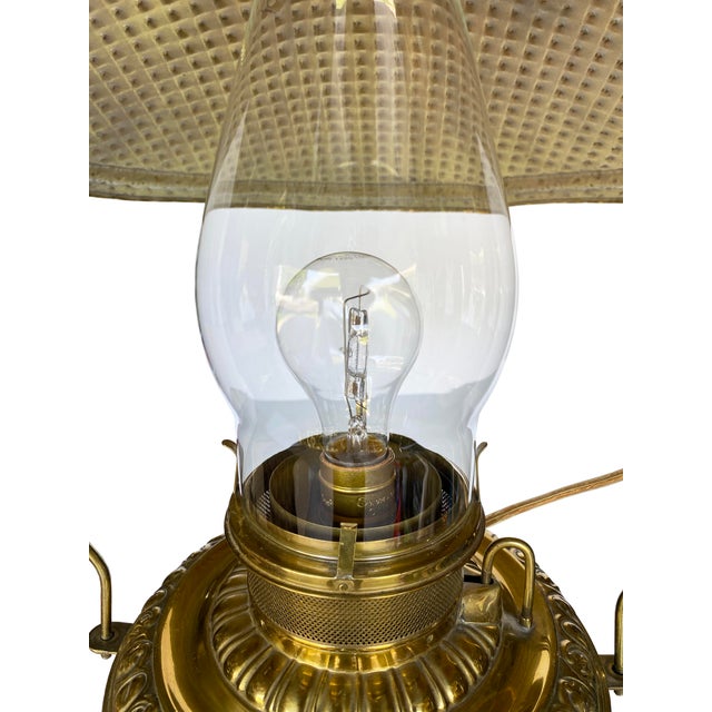 This impressive brass ceiling lamp, labeled and named "The Rochester," is a beautifully preserved and converted piece of...