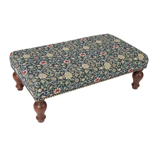 Hand upholstered in the UK with classical studding and hand polished solid beech legs, ideal for an extra seat or a centre...