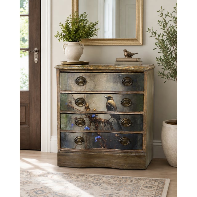 A distinctive vintage four-drawer dresser, artfully updated with a decoupaged bird motif spanning the drawer fronts. The...