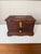 Gorgeous hand carved mahogany jewelry box. Solid wood with lidded top and pull out drawer with brass handles and hardware....