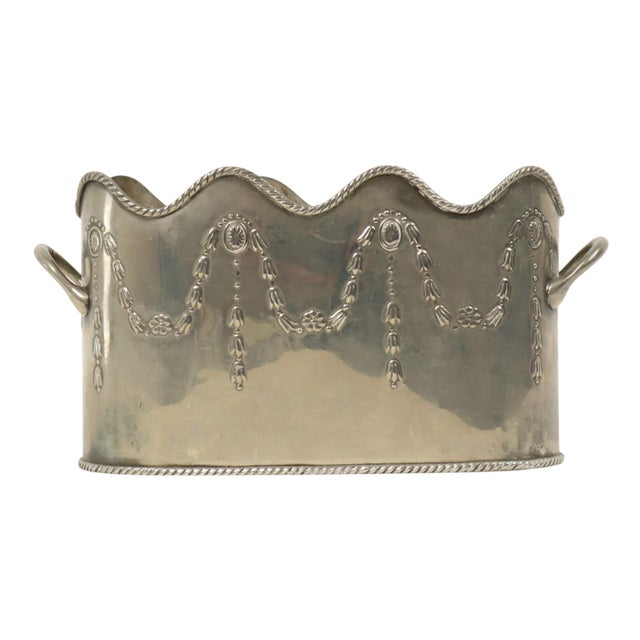 Antique French wine cooler/champagne bucket with two handles, crafted from nickel silver—an alloy of nickel, copper, and...