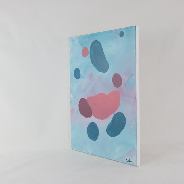 This captivating modern art piece explores the balance of soft, organic forms through a dynamic arrangement of fluid...