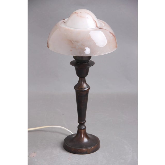 Table lamp in burnished metal. Probably Fog & Morup. Fitted with mirror-egg. The lamp is in good condition. European Plug...