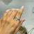 Diamond Studded Regal Emerald Engagement Ring With Marquise Halo, Size 7 For Sale - Image 9 of 14