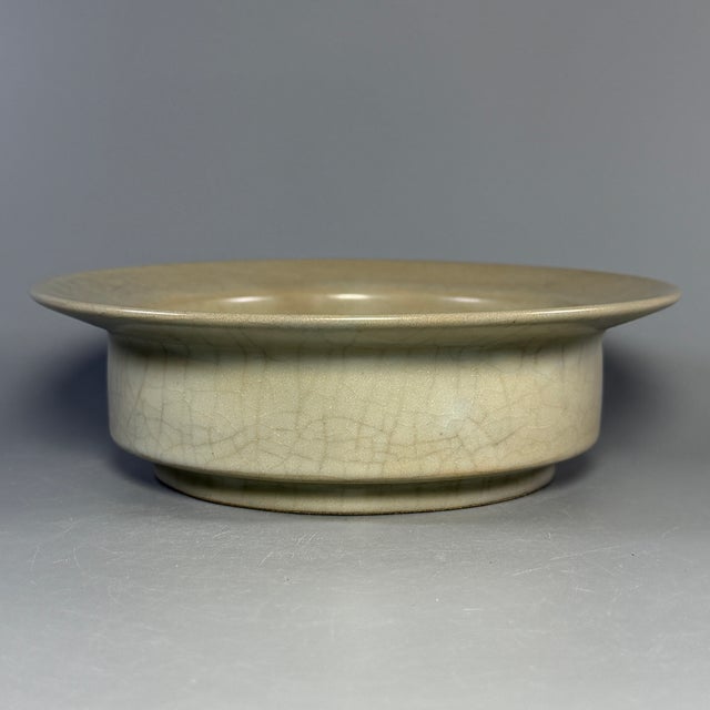 Antique Chinese Guan‑style porcelain plate, once used for royal court. Beautiful natural crackle glaze, simple and elegant...