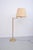 Brass floor lamp with a swiveling arm, made in Germany in the 1970s. The shade is in good condition and measures 39 cm in...