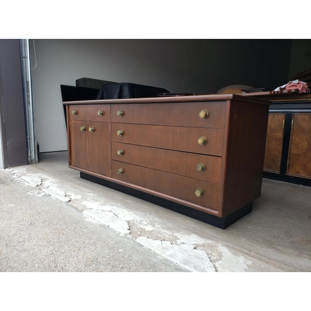 .......really sharp looking 1950's custom lacquered mahogany chest with solid brass hardware designed by Edward Wormley...