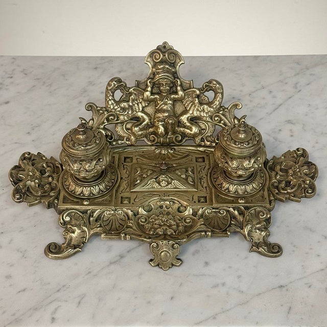 19th Century French Bronze Double Inkwell in Renaissance Revival Style was cast in bronze with extraordinary ambition and...
