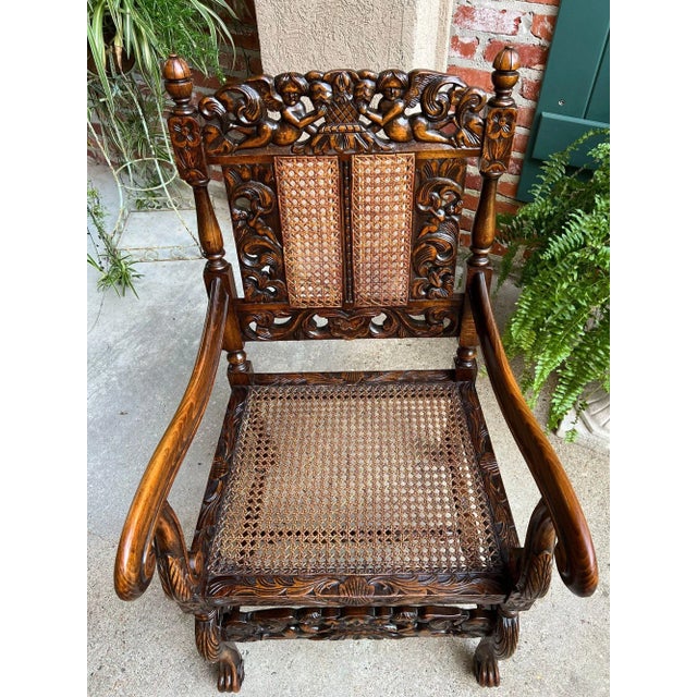 Antique English Arm Chair Carved Oak Cane Seat Renaissance Cherubs Fireside For Sale - Image 9 of 18