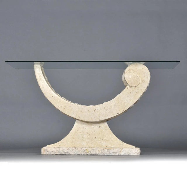 Elegantly curved tessellated stone console table. The table base is made of Mactan stone, a type of coral. It seems...