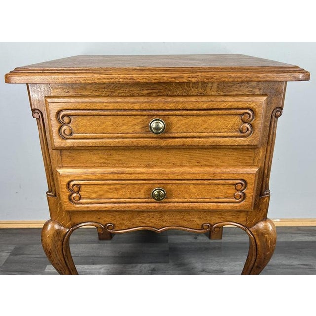 This charming Vintage French Louis bedside table offers warm character, elegant curves and beautifully crafted details....