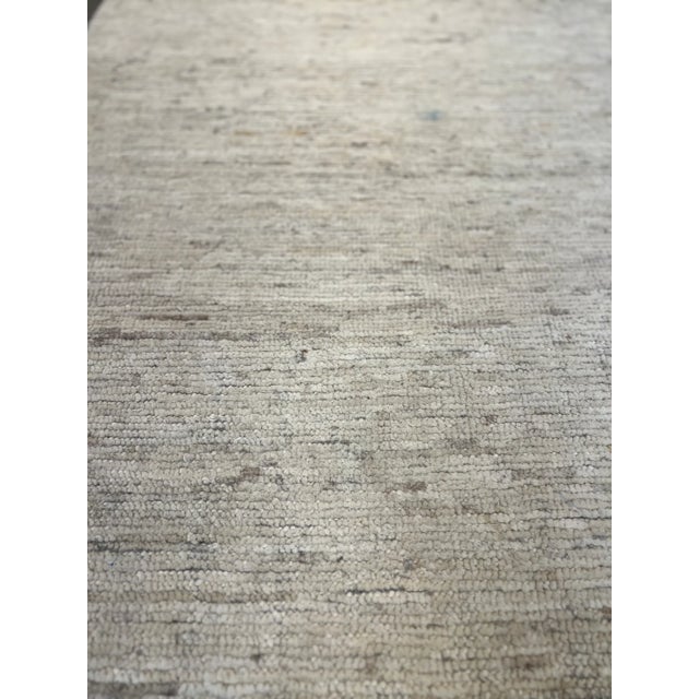 Hand knotted rug in simple pattern. Perfect for many rooms and locations.