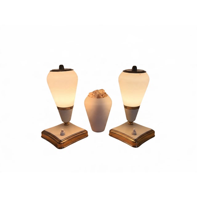 A beautifully designed pair of mid-century table and bedside lamps from the late 1950s or early 1960s. • Timeless design:...