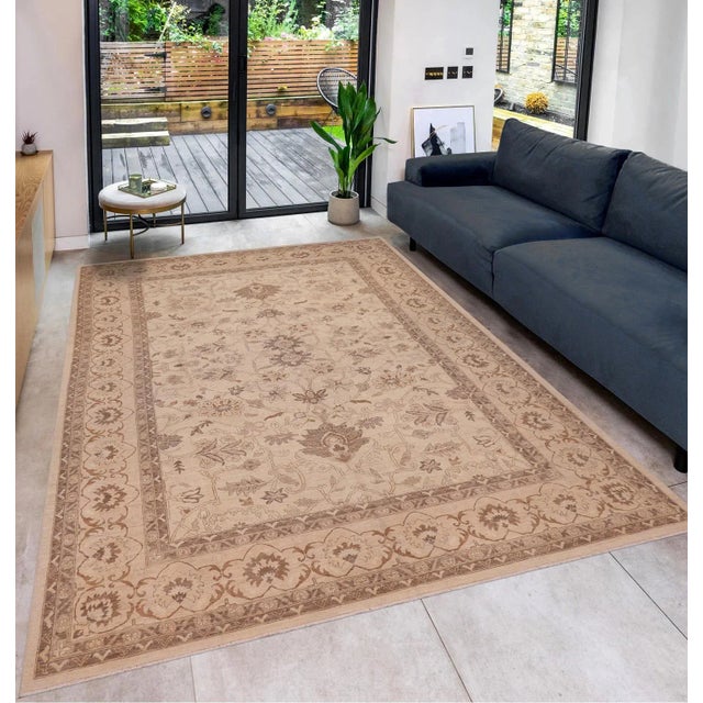 "Enhance the ambiance of your home with this magnificent Persian-influenced Turkish hand-knotted rug made by skilled...
