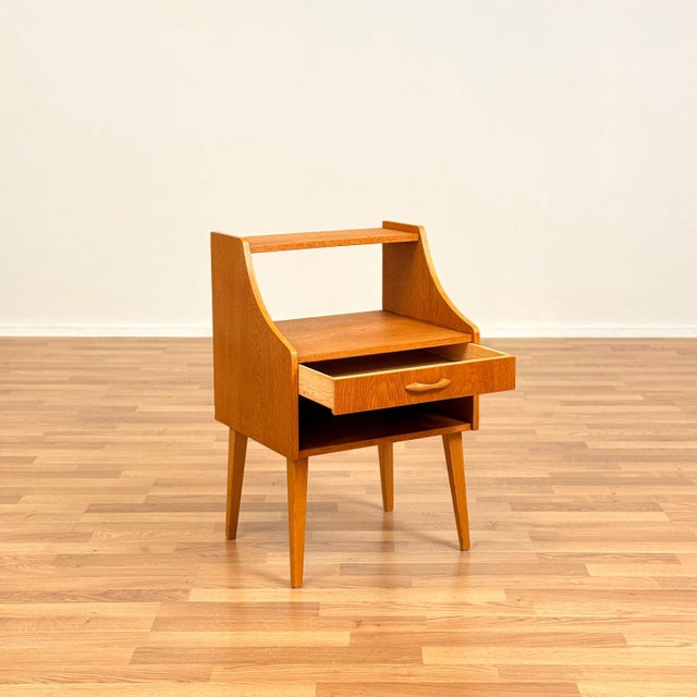 Side table was manufactured in Sweden in the 1950s-60s. It is made of beech veneer. The table has been carefully restored...