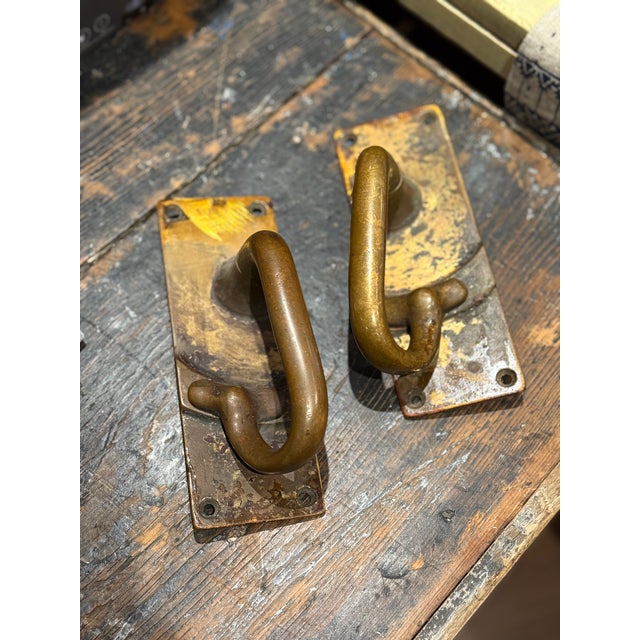 A solid antique bronze steam train car pull handle by Dayton Manufacturing. This heavy, industrial-grade handle was...