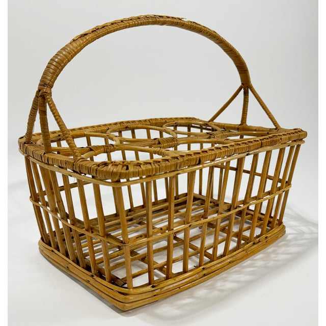 Vintage woven rattan bottle caddy. Substantial handle. Holds 6 bottles or tall glasses. Doubles nicely as caddy for...