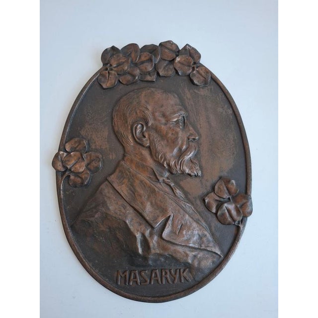Exceptional 1920 oval wall plaque depicting T. G. Masaryk, the first President of Czechoslovakia. Decorated with a...