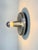 Compact space-age wall or ceiling light made of brushed aluminum. with a mirrored bulb, the lamp provides beautiful light....