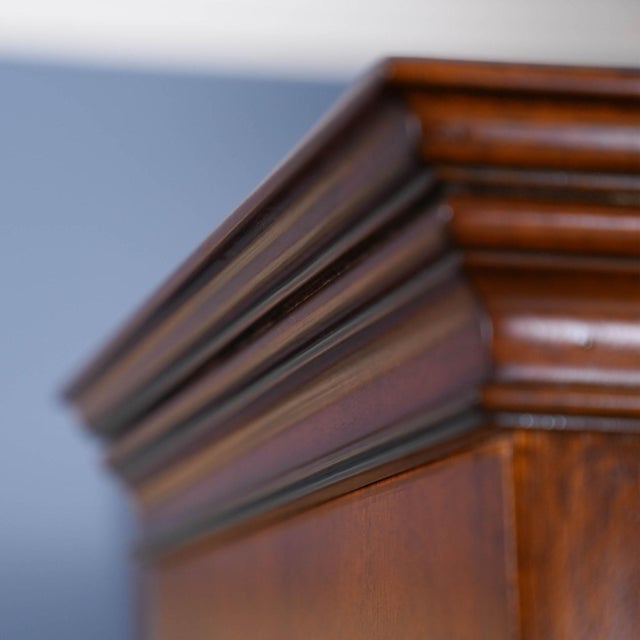 An excellent quality Large Mahogany Bookcase produced by Niagara Furniture. The top section features a moulded cornice...