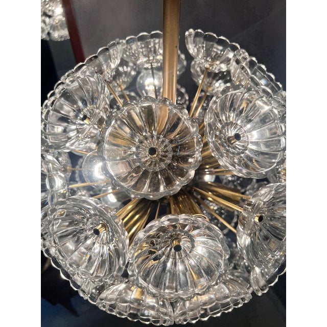 The "pusteblume" is a well-known east german crystal lamp that was produced in the gdr, in particular by the company veb...