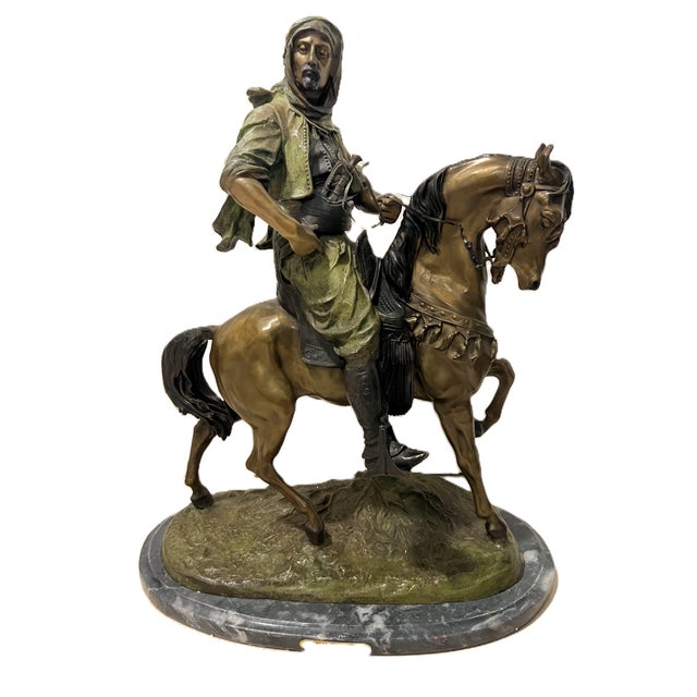 This sculpture is a notable example of Orientalist art from the 19th century, typically titled "Arab on Horse" or...