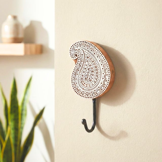 Transform your entryway into a welcoming sanctuary with our Hand Carved Paisley Wall Hook. This exquisite piece of wall...
