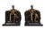 A pair of "Lincoln in the Chair" brass bookends, made by the Philadelphia Manufacturing Company. A polished brass Lincoln...