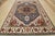 This traditional tribal Serapi rug is hand-knotted with an all-wool pile on a cotton foundation. This rug is new and in...