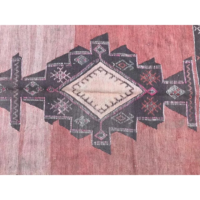 Very beautiful long Kilim mid-20th century, with a geometric design and an orange field color, entirely handwoven with...