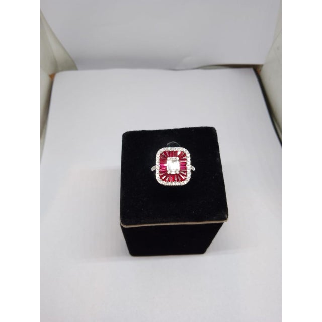 Gemstone details Gold Purity: 18K Solid Gold Ruby: 1.83 cts Diamond: 0.62 cts 18K gold Net weight: 5.09 grams Gross...
