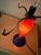 This striking decorative table lamp has a molded glass base reminiscent of Art Deco styling. The coloration is a deep blue...