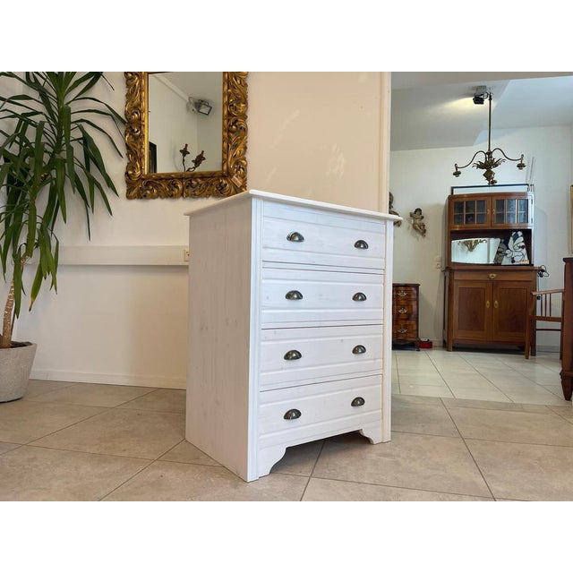 Dimensions: Height x Width x Depth in cm: 100 x 80 x 55 For sale is an enchanting chest of drawers made of spruce wood,...
